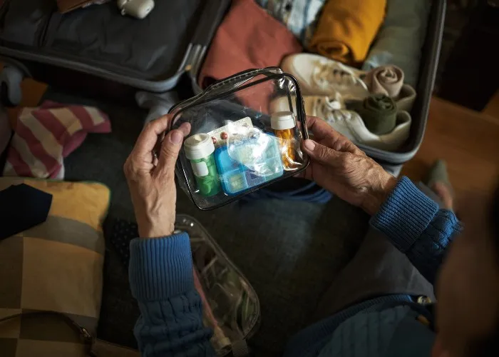 Contenitore di farmaci quando si parte per una vacanza