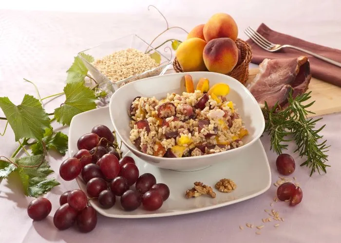 Risotto all'uva in una variante anche con le pesche